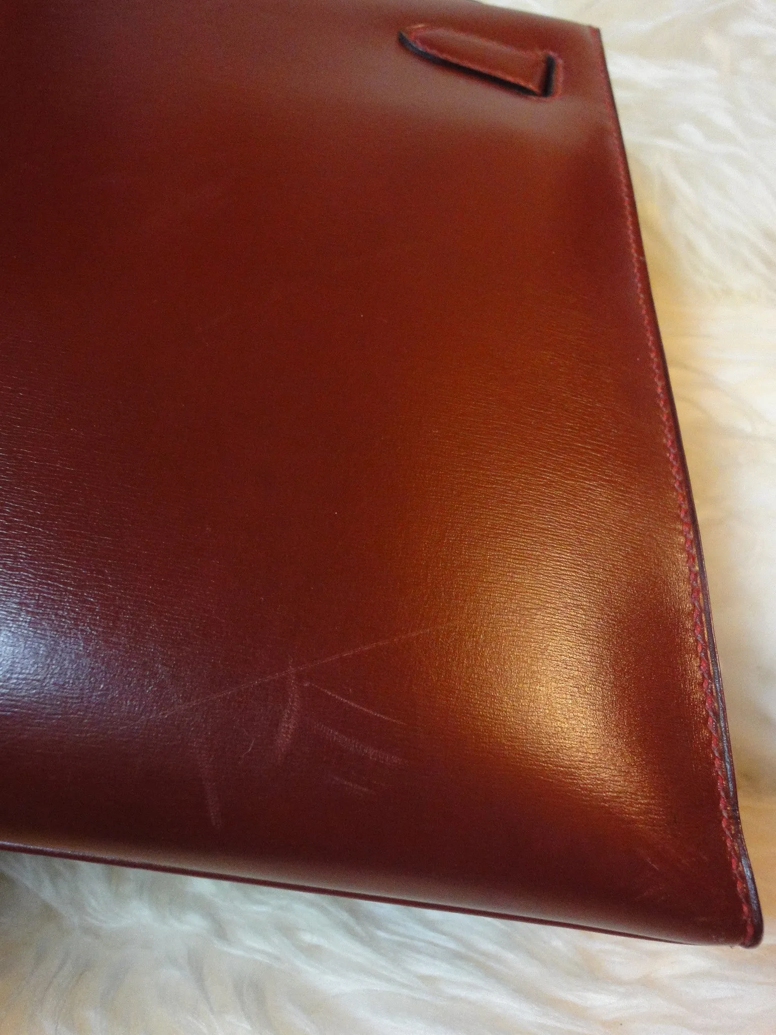 1980s Vintage HERMES Kelly 32 bag rouge ash box calf leather with gold hardware. Exterior stitch. Stamp K in O, 1981. Best known classic bag
